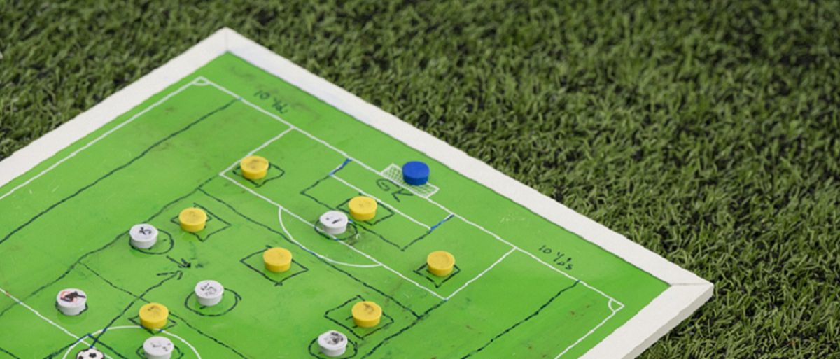 Strategic Sports Boards Preparing For A Soccer Match.