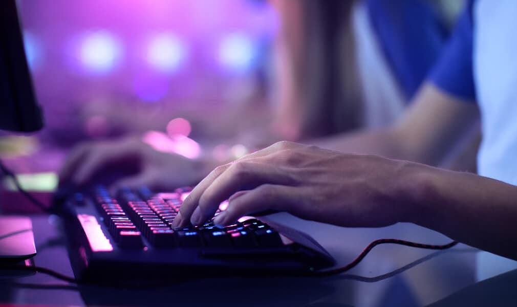 Person typing on a keyboard