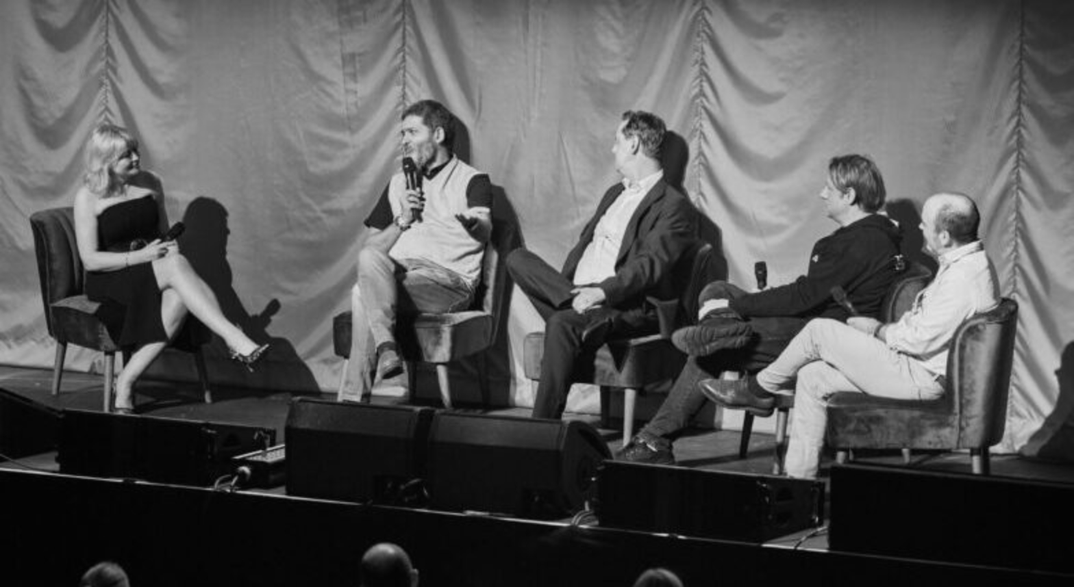 Customers sharing their experience working with Equal Experts on stage at the Equal Experts Global Conference.